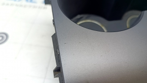 Tesla Model Y 20-25 center console cup holders, gray trim, backlit, scratches, bulging