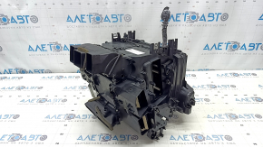 The bare heater housing of the Audi A4 B9 17-25 air conditioner.