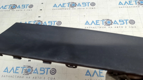 The rear bumper cap for the towbar of a Tesla Model Y 20-25 is bent.