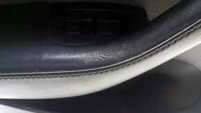 Tesla Model Y 20-25 front left door panel, black leather, with backlighting, matte trim, suede insert, with power window controls, with door opening button, worn leather, scratches