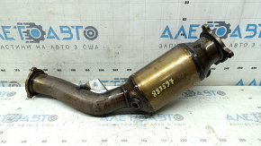 The exhaust pipe with a catalytic converter for the Audi A4 B8 13-16 rest 2.0T is dented.
