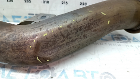 The exhaust pipe with a catalytic converter for the Audi A4 B8 13-16 rest 2.0T is dented.