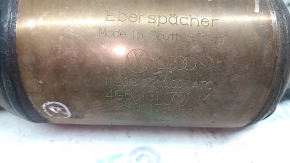 The exhaust pipe with a catalytic converter for the Audi A4 B8 13-16 rest 2.0T is dented.