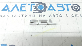 The SE Black Edition emblem on the tailgate of the Mitsubishi Outlander 22-25
