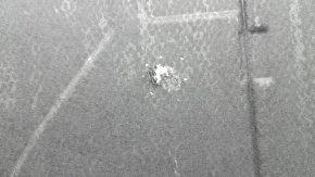 The trunk floor of a BMW 3 G20 19-25 is black and has tears, without a spare tire.