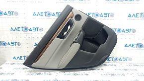 Rear left door panel for a Honda CRV 17-22, black, gray leather armrest, gray leather insert, wood-like molding, with a handle, scratches, needs cleaning, crack