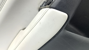 Rear left door panel for a Honda CRV 17-22, black, gray leather armrest, gray leather insert, wood-like molding, with a handle, scratches, needs cleaning, crack