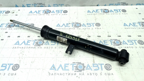 The rear left shock absorber of the BMW 3 G20 19-25 2.0T RWD is dented.