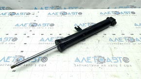 The rear left shock absorber of the BMW 3 G20 19-25 2.0T RWD is dented.