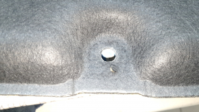 Nissan Rogue 21-24 hood insulation is torn and dented.