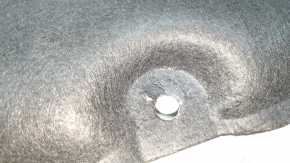 Nissan Rogue 21-24 hood insulation is torn and dented.