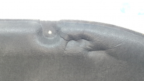 Nissan Rogue 21-24 hood insulation is torn and dented.