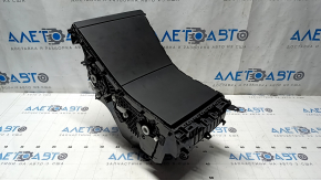 Tesla Model Y 20-25 center console pocket with backlighting, covered with matte film