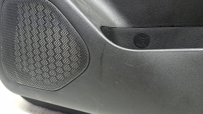 Front right door panel for Nissan Rogue 23-24 US built, black with black leather insert, leather armrest, brown top, with handle and trim, scratches