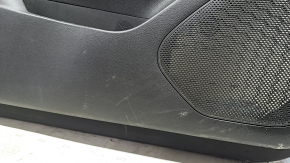 Front left door panel for Nissan Rogue 23-24 US built, black with black leather insert, leather armrest, brown top, with handle and trim, scratches
