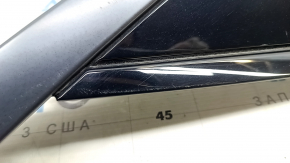 Right rear fender triangle cap for Nissan Ariya 23-25 with black molding, scratches