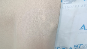 Nissan Rogue 14-20 lower right center pillar trim, beige, with plug, worn, plastic turned white
