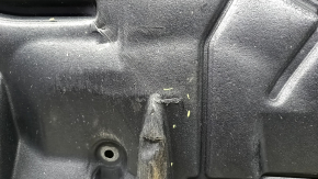 Left engine guard for Toyota Camry V55 2015-2017 USA is worn, pinched, and torn.