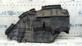 Left engine guard for Toyota Camry V55 2015-2017 USA is worn, pinched, and torn.