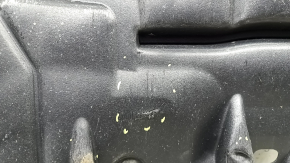 The right engine guard for a Toyota Camry V55 2015-2017 is worn, pinched, and torn.