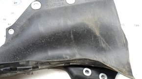 The lower part of the front right fender liner of the Nissan Ariya 23-25 is dented.