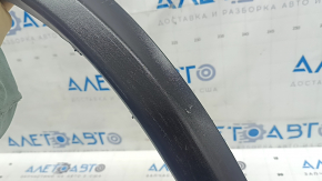 Rear left fender arch trim for Infiniti QX50 19-20. Structure, scratches, crack in fastening. Needs cleaning.