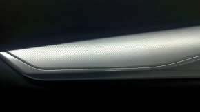 Black front left door panel for Infiniti QX50 19-22, black leather insert, black leather armrest, gray stitching, glossy gray molding, with backlight, with handle, dented, scratches