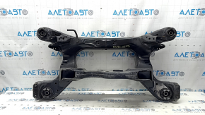 The rear subframe of an Infiniti QX50 19-25 FWD has a dented camber bolt.