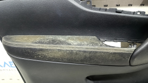 Front left door panel for a 17-20 Nissan Rogue, black with black plastic insert, leather armrest, needs cleaning, scratches