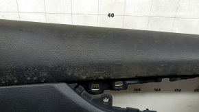 Front left door panel for a 17-20 Nissan Rogue, black with black plastic insert, leather armrest, needs cleaning, scratches