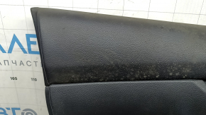Front left door panel for a 17-20 Nissan Rogue, black with black plastic insert, leather armrest, needs cleaning, scratches