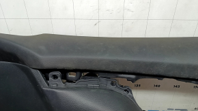 Front right door panel for a 17-20 Nissan Rogue, black with a black plastic insert, leather armrest, needs cleaning, scratches