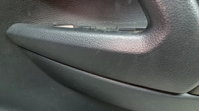 Front right door panel for a 17-20 Nissan Rogue, black with a black plastic insert, leather armrest, needs cleaning, scratches