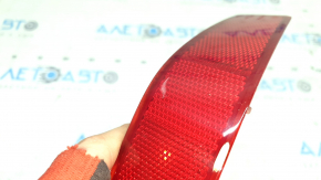 Left rear bumper reflector for Nissan Rogue 17-20, scratches in paint