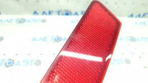 Left rear bumper reflector for Nissan Rogue 17-20, scratches in paint