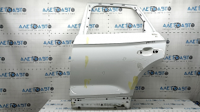Bare rear left door of Audi Q5 80A 18-24 white LY9C, bumps, dented edge