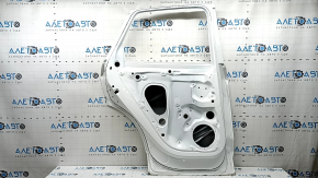 Bare rear left door of Audi Q5 80A 18-24 white LY9C, bumps, dented edge