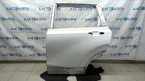 The door is bare, rear left, Honda CRV 17-22, white NH-883P, dented, with bumps and scratches.