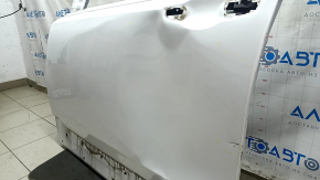 The front left door of a Honda CRV 17-22, white, NH-883P, is dented, has dents, and scratches.