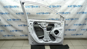 The front left door of a Honda CRV 17-22, white, NH-883P, is dented, has dents, and scratches.