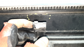 The lower front right door trim panel for a Honda CRV 17-22 has a broken mount.