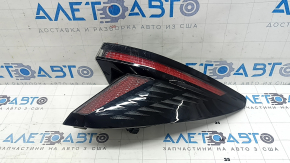 Hyundai Tucson 22-25 LED right outer fender light is worn.