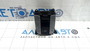 The Hyundai Tucson 22-24 center console button block has peeling coating and scratches.