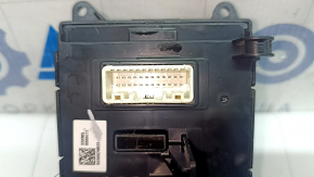 The Hyundai Tucson 22-24 center console button block has peeling coating and scratches.