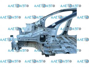 Front left quarter panel of a 2020 Nissan Ariya on a white XGA body