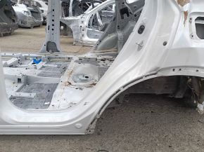 Left rear fender lip on a Honda CRV 20-22 hybrid, white, bumper
