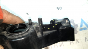 The front bumper mount on the left fender of the Audi A6 C8 19-24 is broken.
