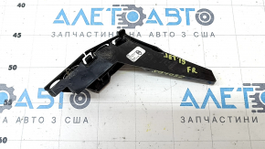 The front bumper mount, right, for a VW Jetta 19-21 is broken.