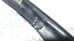 The front right hood seal on an Audi A6 C8 19-24 is broken.