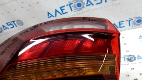 Left outer fender light for a 2019 VW Jetta, scratches, glued on